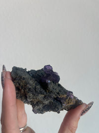 Load image into Gallery viewer, Tanzanite Fluorite on matrix
