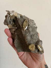 Load image into Gallery viewer, Gem calcite on matrix from Sweetwater Mine
