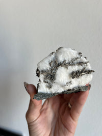 Load image into Gallery viewer, Feathered Silver after Dyscrasite on Calcite
